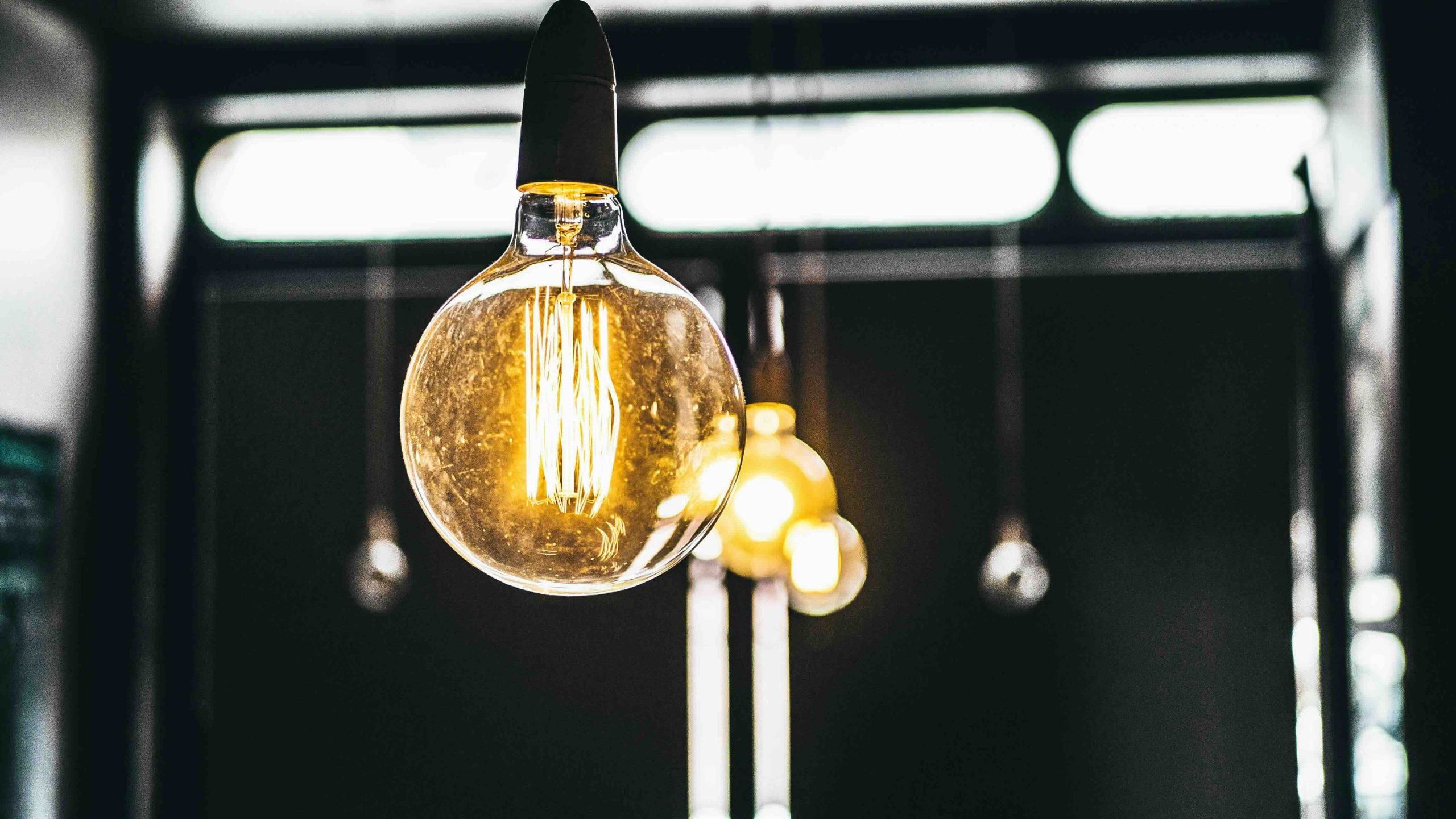 Image of a lightbulb against a black background